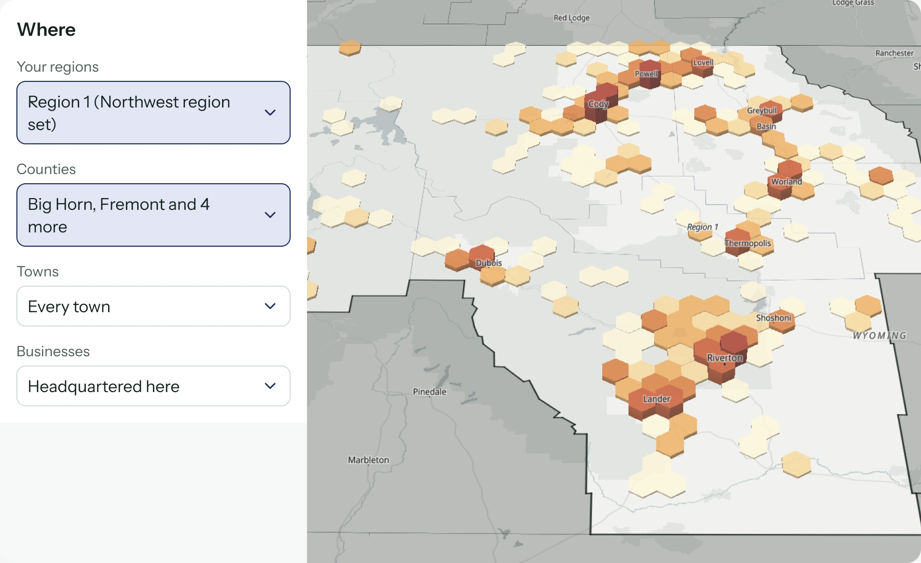 A selected custom region on the Wyoming hex map beside geography filters: Region 1, selected counties, Every town, and Headquartered here.
